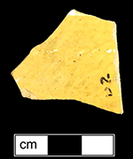 Midlands Yellow, body sherd from indeterminate vessel with colorless lead glaze interior and exterior of buff paste from an unprovenienced site.